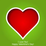 Abstract red heart cutted from green paper background Valentine