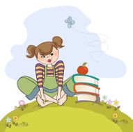 studious girl sitting barefoot in the grass