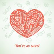 Greeting card with heart and candies