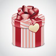 Round pink gift box with stripes