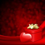 Red gift with heart on silk Valentine&#039;s day