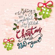 Hand drawn Christmas text on a textured background with Mistletoe