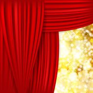 Holiday background with red satin and blurred lights