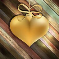 Gold heart on wooden background EPS10