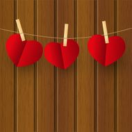 Paper hearts on wooden background N8