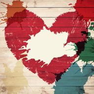 Old wooden background with watercolor heart shape and splashes