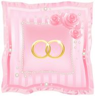 Wedding rings on a pink background