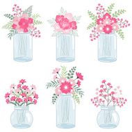 Pink flowers in mason jars