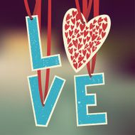 love paper garland on blurred background