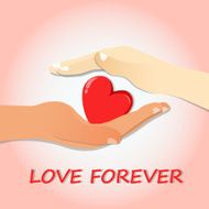 Heart in Man and Woman Hands over pink Background