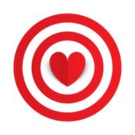 Red paper heart in the center of darts target aim