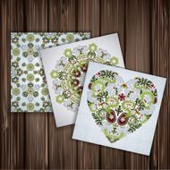 Set of banners with floral patterns on wood background N2