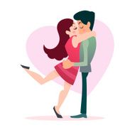 Young couple kissing infront of red heart for valentine&#039;s day