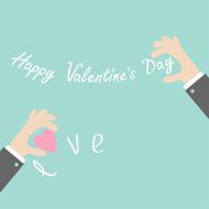 Businessman hands holding Valentines day text and word love Flat