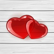 Red hearts on wooden background