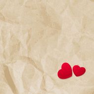 Red hearts on vintage paper EPS 10