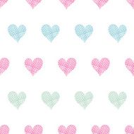Colorful polka dot textile hearts seamless pattern background