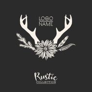 Rustic premade typographic logo with flowers branches antlers and feathers