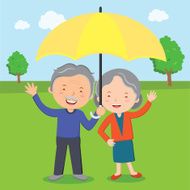 Elderly couple with umbrella