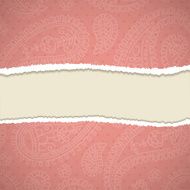 Torn paper with a paisley pattern