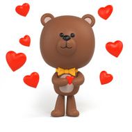 cute little chocolate teddy bear holding red heart Valentine day