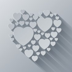 Grey and white paper heart shape on gray background with