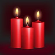 Three red burning candles on black background