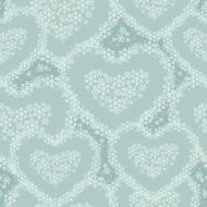 Seamless pattern with hearts lined by snowflakes