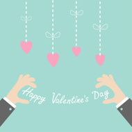 Businessman hands holding Valentines day text Hanging dash line hearts