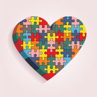 Abstract heart made of puzzle pieces Vector