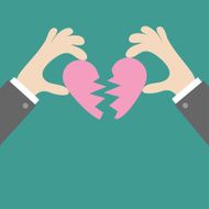 Businessman hands holding pink broken heart Flat design