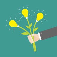 Businessman hand holding idea light bulb flowers Flat design