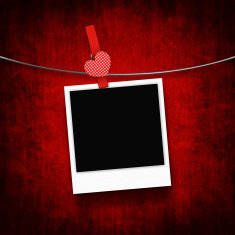photo hanging on clothesline with heart clothespin