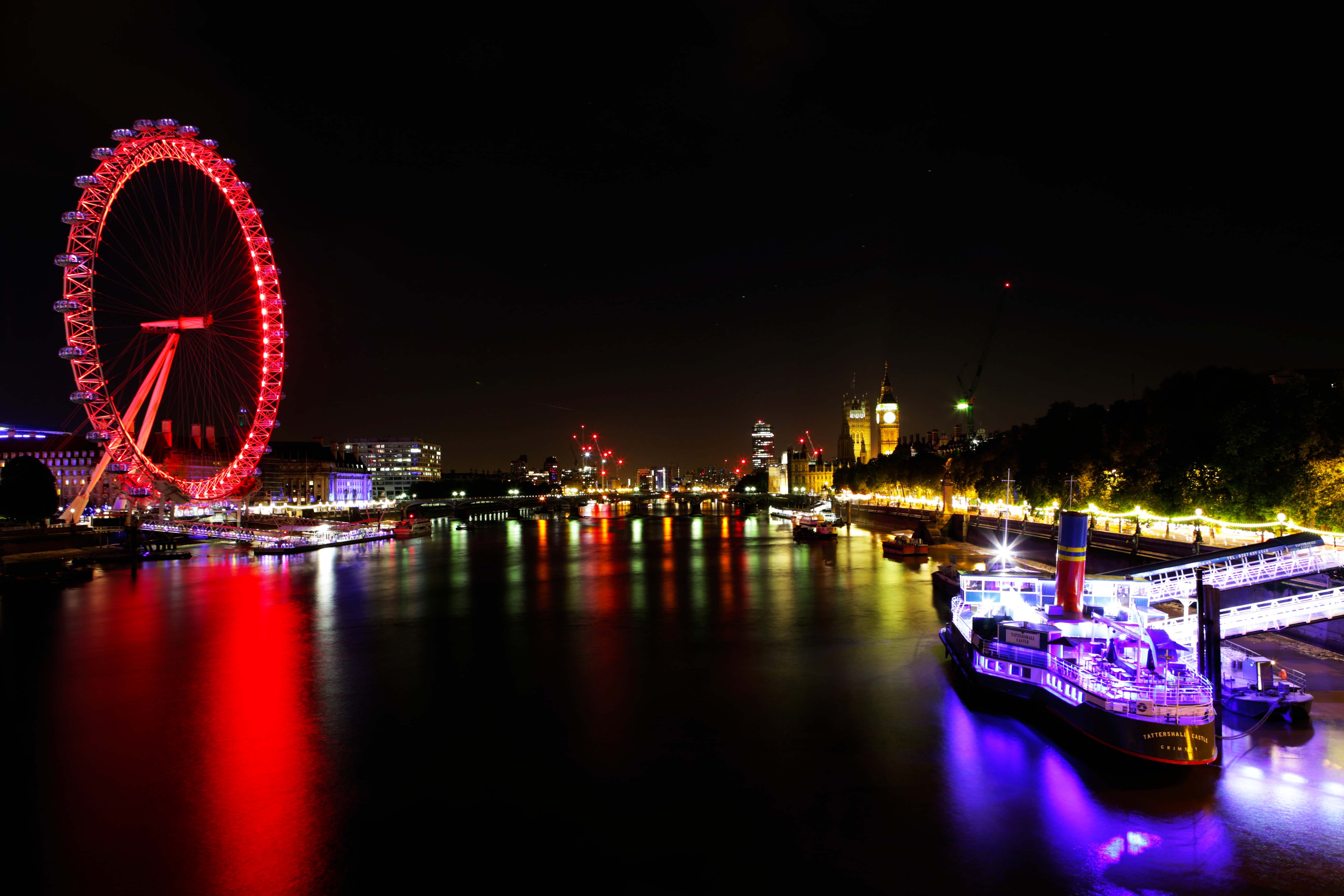 Illuminated london eye at night free image download