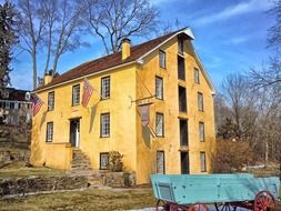 historic building and blue cart in Pennsylvania