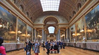 Tourists at the gallery in Versailles