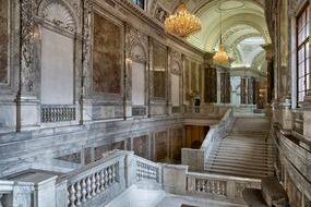 Marble interior and chandeliers in the Hofburg Palace, Austria