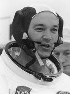 Black and white portrait of astronaut Michael Collins