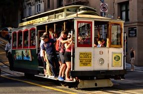 people ride the tram