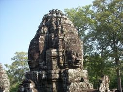 exterior of the pillar tower of The Angkor Wat in Cambodia