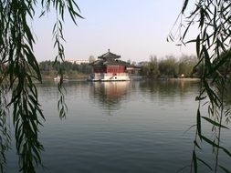 buddhist temple on lake shore