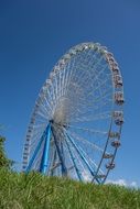 ferris wheel on the meadow