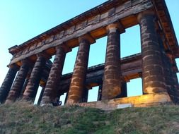 ruined historic building with columns