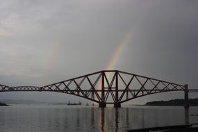 bridge in scotland on a rainbow background