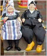 funny street dolls in traditional clothing in holland