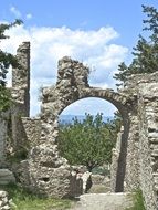 arch among the ruins of a monastery