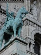 statue of a horseman in front of the Basilica of Saint Louis, King of France