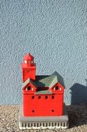 Little red lighthouse statue