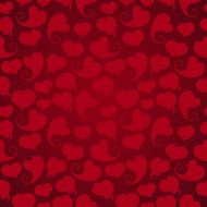 Seamless pattern with red hearts on a background