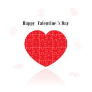 red puzzle heart shape on background